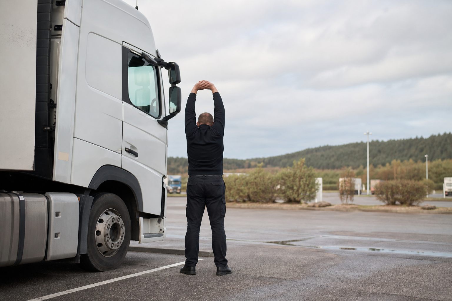 HGV driver taking a mandatory break at a service area