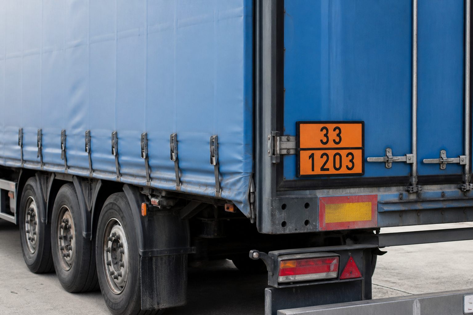 HGV displaying orange ADR plates for dangerous goods